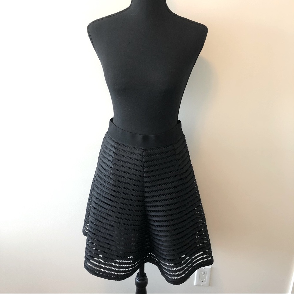 Black A-line skirt with lace details